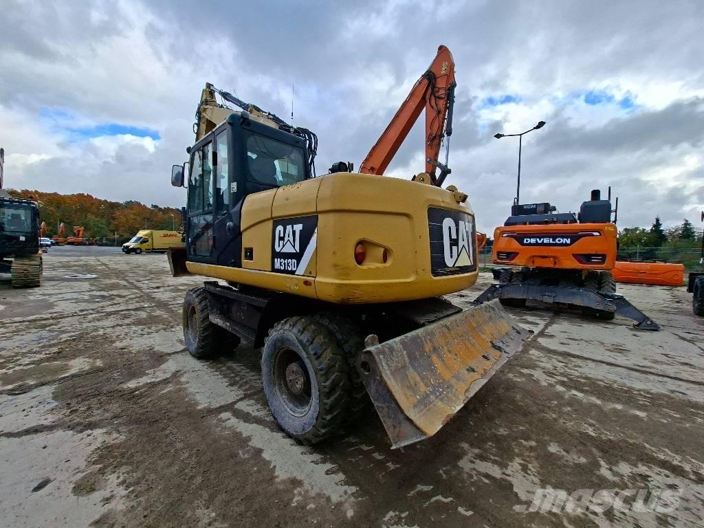 CAT M313D Колісні екскаватори