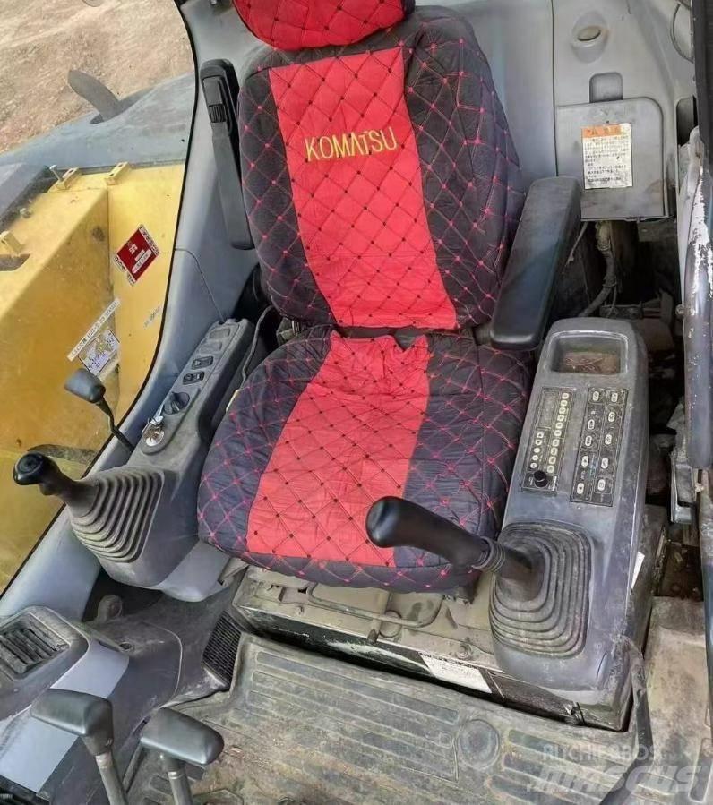 Komatsu PC78US Гусеничні екскаватори