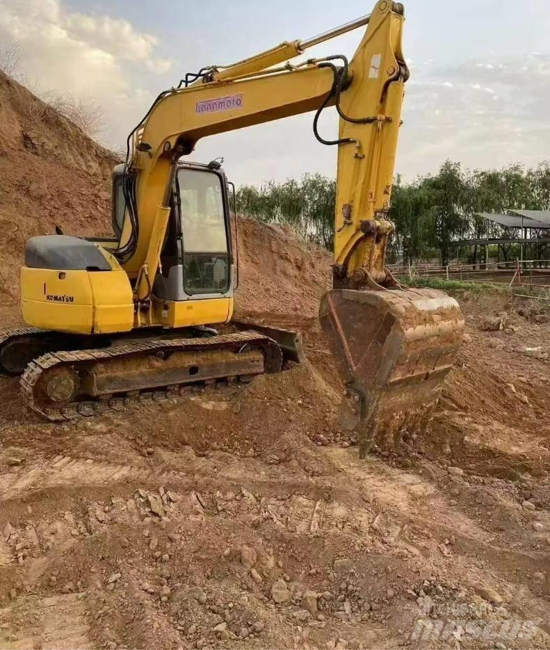 Komatsu PC78US Гусеничні екскаватори