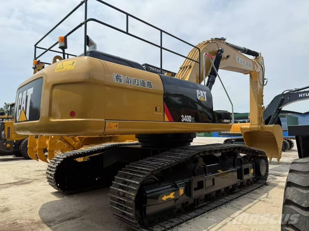 CAT 340 Гусеничні екскаватори