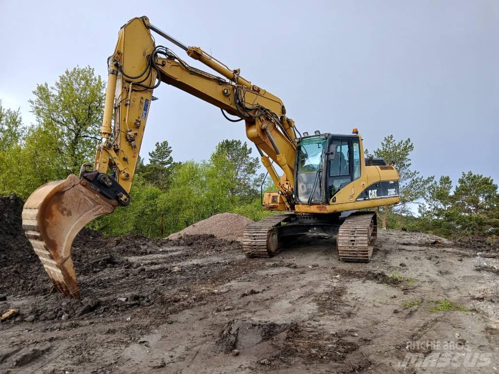 CAT 318 C L Гусеничні екскаватори