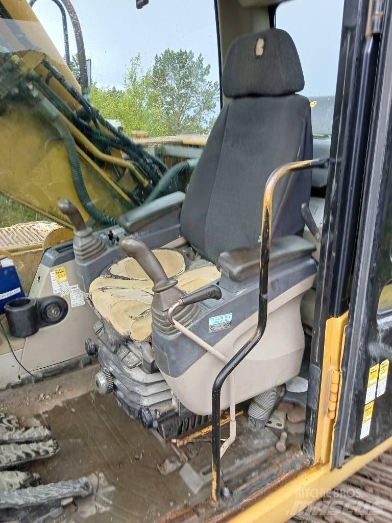CAT 318 C L Гусеничні екскаватори