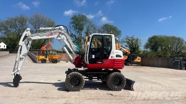 Takeuchi TB295W Колісні екскаватори