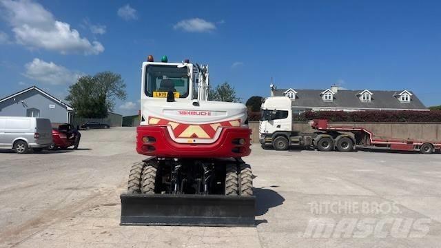 Takeuchi TB295W Колісні екскаватори