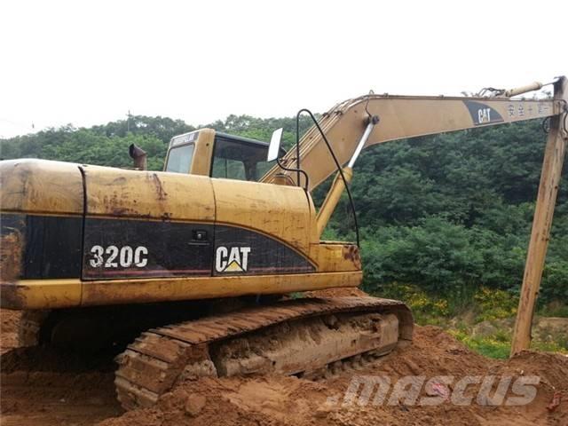 CAT 320 C Екскаватори з великим вилітом