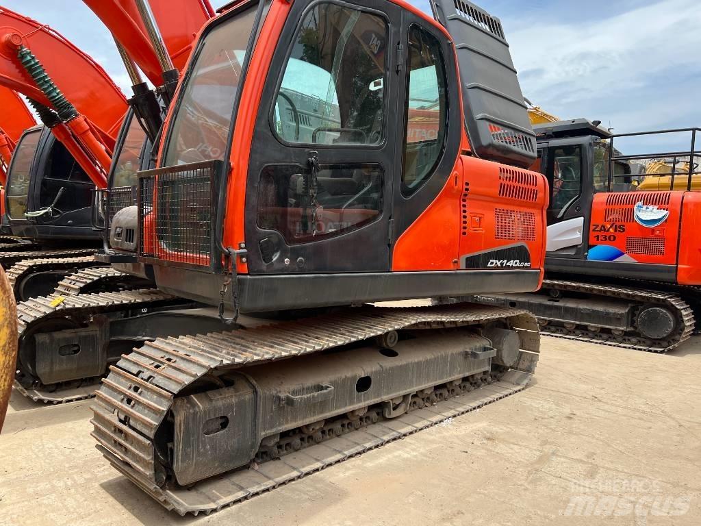 Doosan DX140 Гусеничні екскаватори