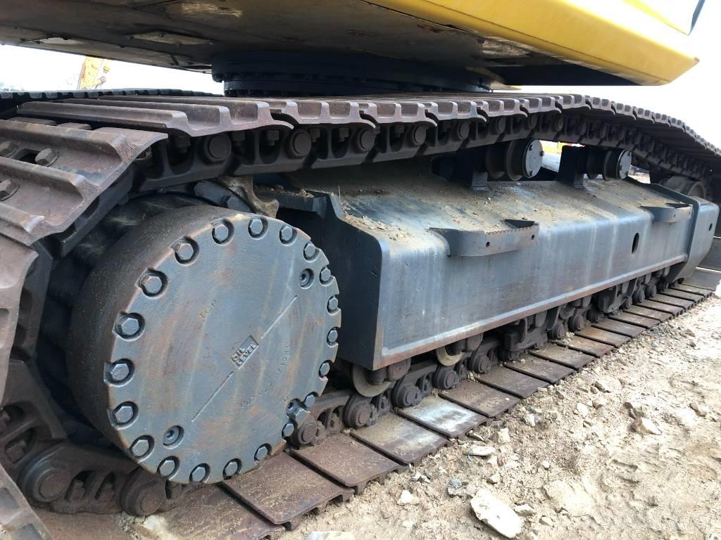 Komatsu 300 -7 Гусеничні екскаватори