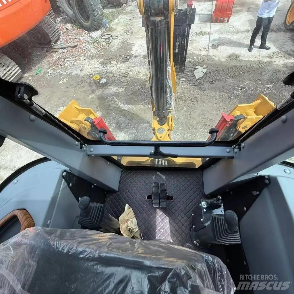 CAT 420 D Екскаватори-навантажувачі