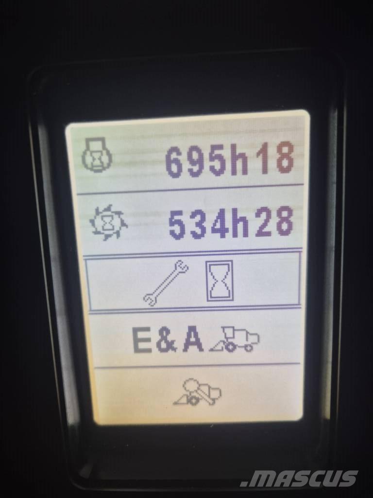 New Holland TC 5.90 Зернозбиральні комбайни