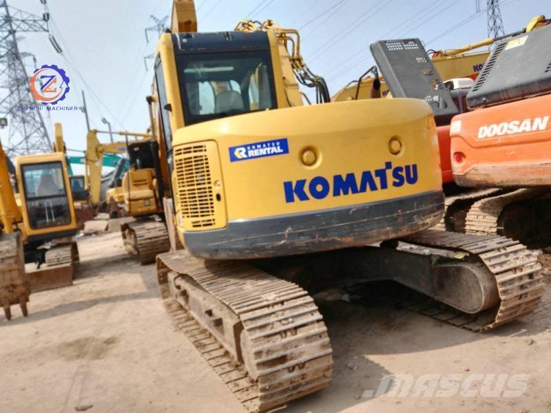 Komatsu PC 128 US Середні екскаватори 7т. - 12т.