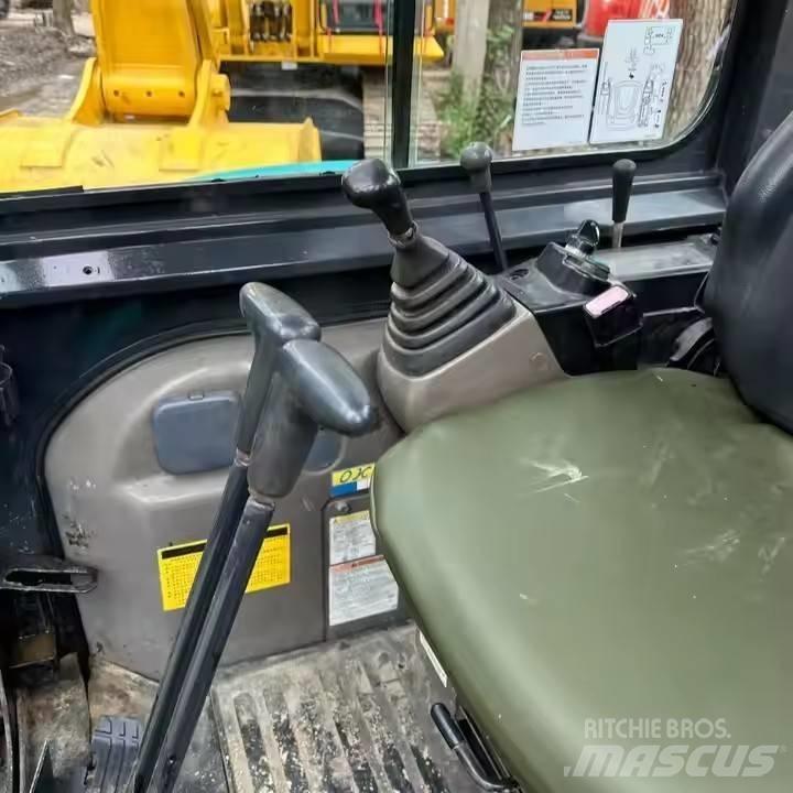 Kobelco SK55 Гусеничні екскаватори
