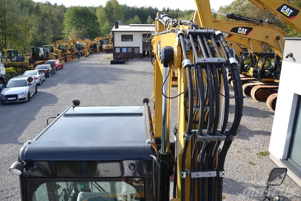 CAT M 315 D Колісні екскаватори