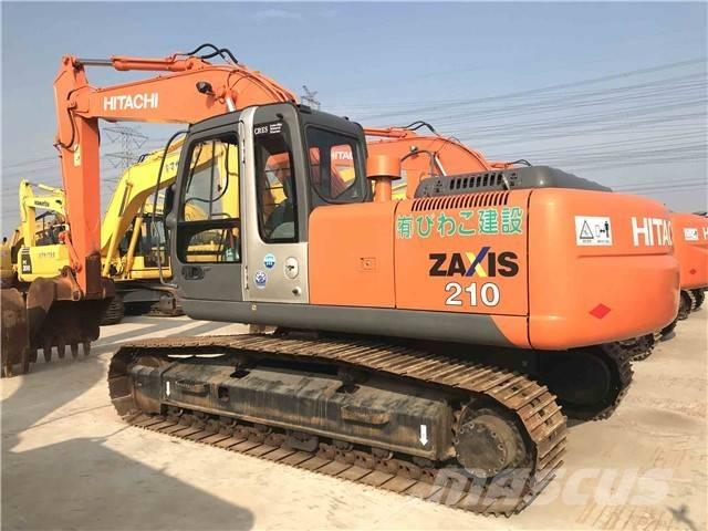 Hitachi ZX 210 Гусеничні екскаватори