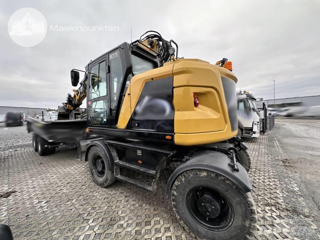 CAT M 315 Колісні екскаватори