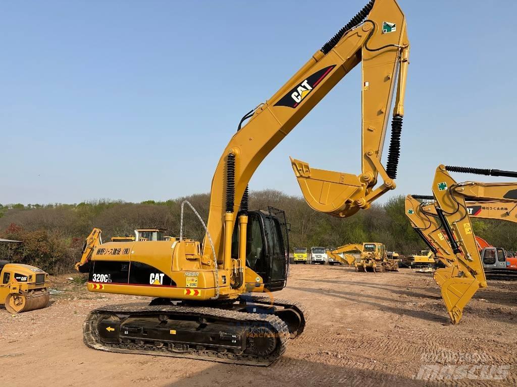 CAT 320 C L Гусеничні екскаватори