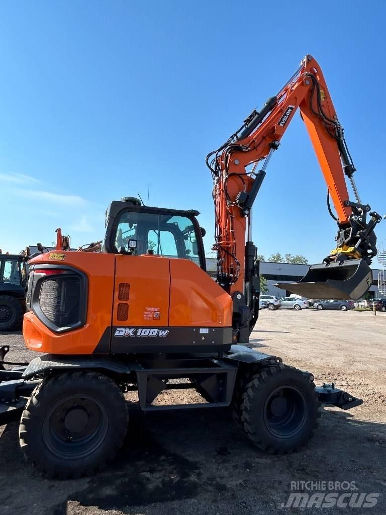 Develon DX 100 W-7 Колісні екскаватори