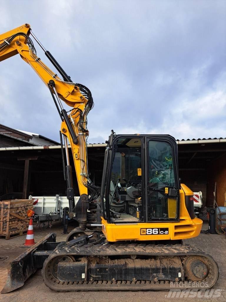 JCB 86 C-2 Середні екскаватори 7т. - 12т.
