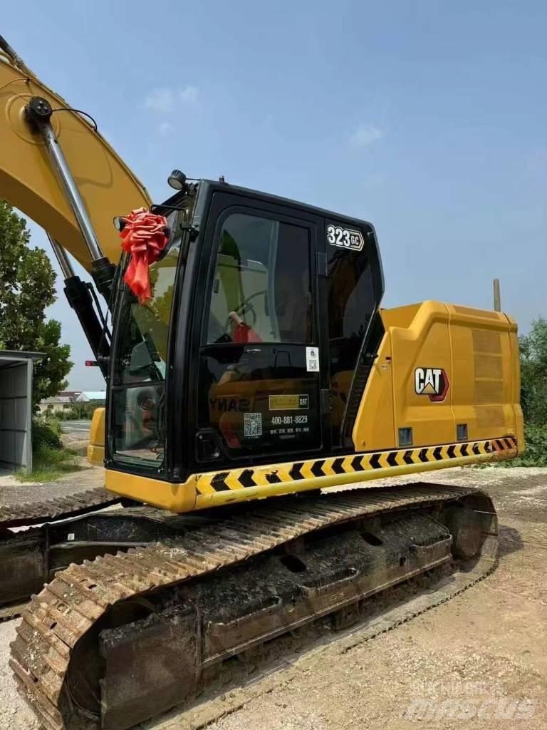 CAT 323GC Гусеничні екскаватори
