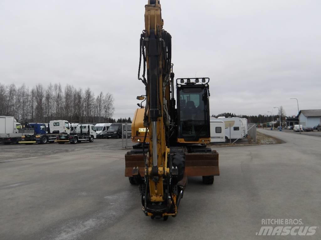 CAT M 318 Колісні екскаватори