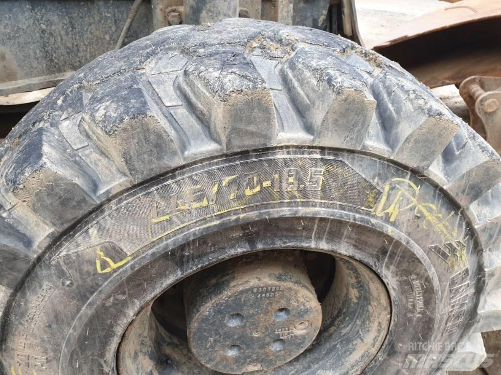 Komatsu PW180-7 Колісні екскаватори