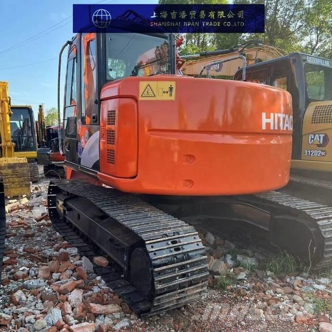 Hitachi ZX 135 Гусеничні екскаватори
