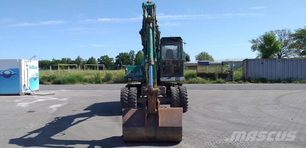 Atlas 1404 Колісні екскаватори