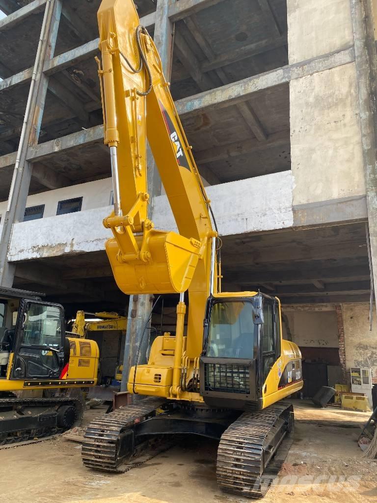 CAT 320 C Гусеничні екскаватори