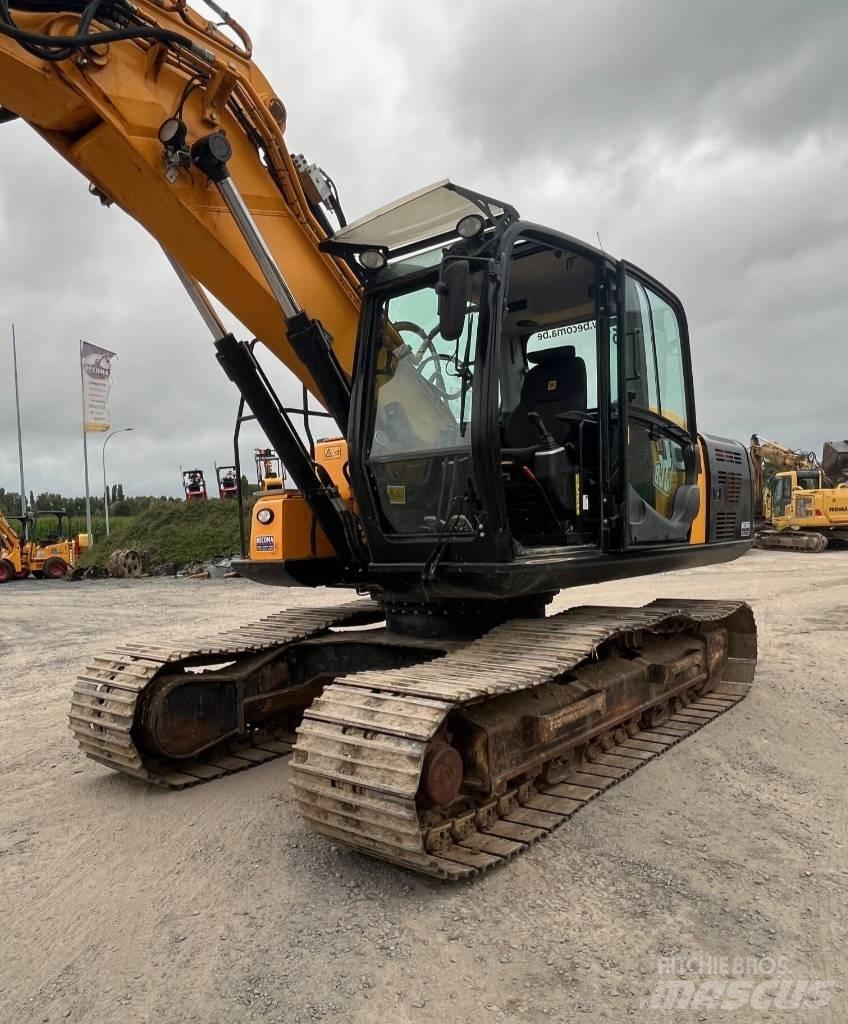 JCB JS 220 Гусеничні екскаватори