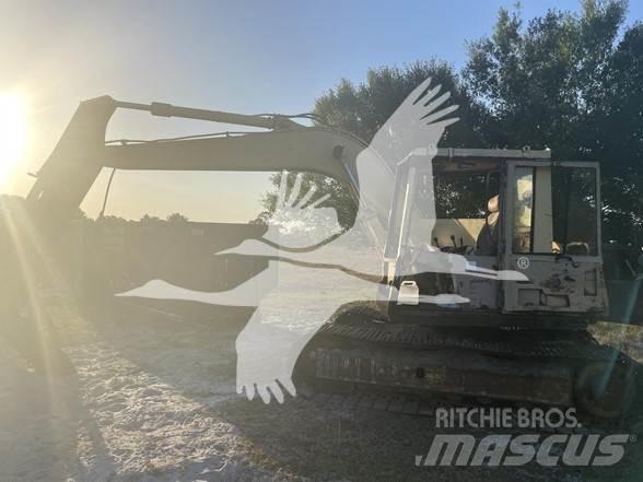 CAT 235B Гусеничні екскаватори