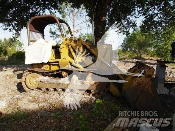 John Deere 450 Гусеничні вантажники