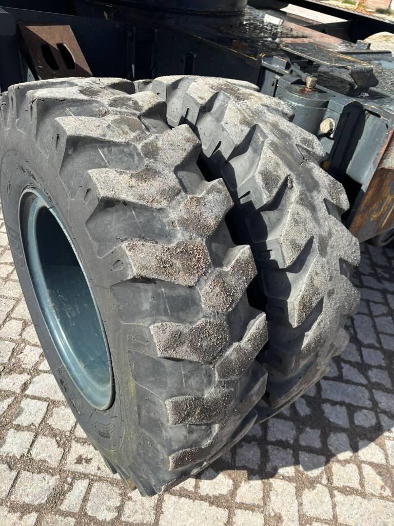 Hyundai 140W-7A Колісні екскаватори