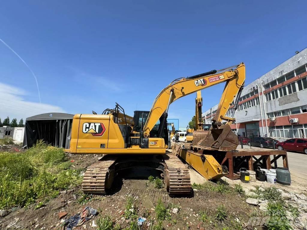 CAT 323GC Гусеничні екскаватори