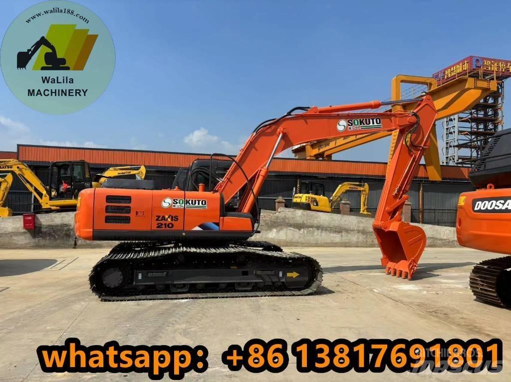 Hitachi ZX 210 Гусеничні екскаватори
