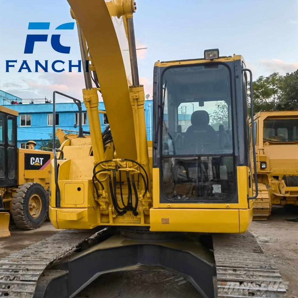 Komatsu PC 128 US Гусеничні екскаватори
