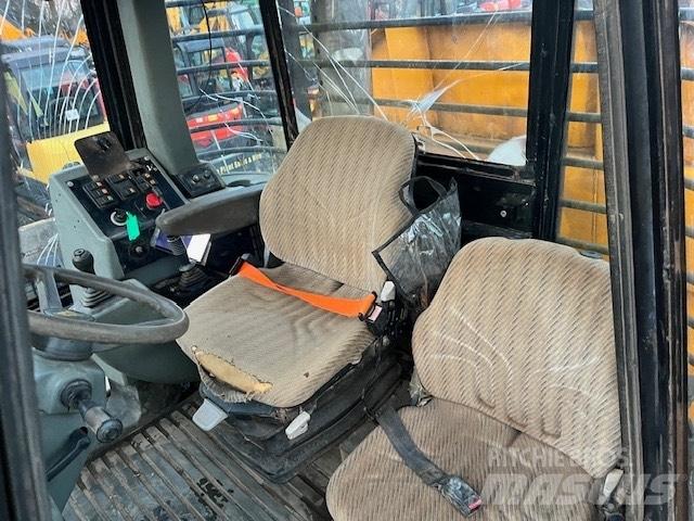 JCB 714 Зчленовані самоскиди