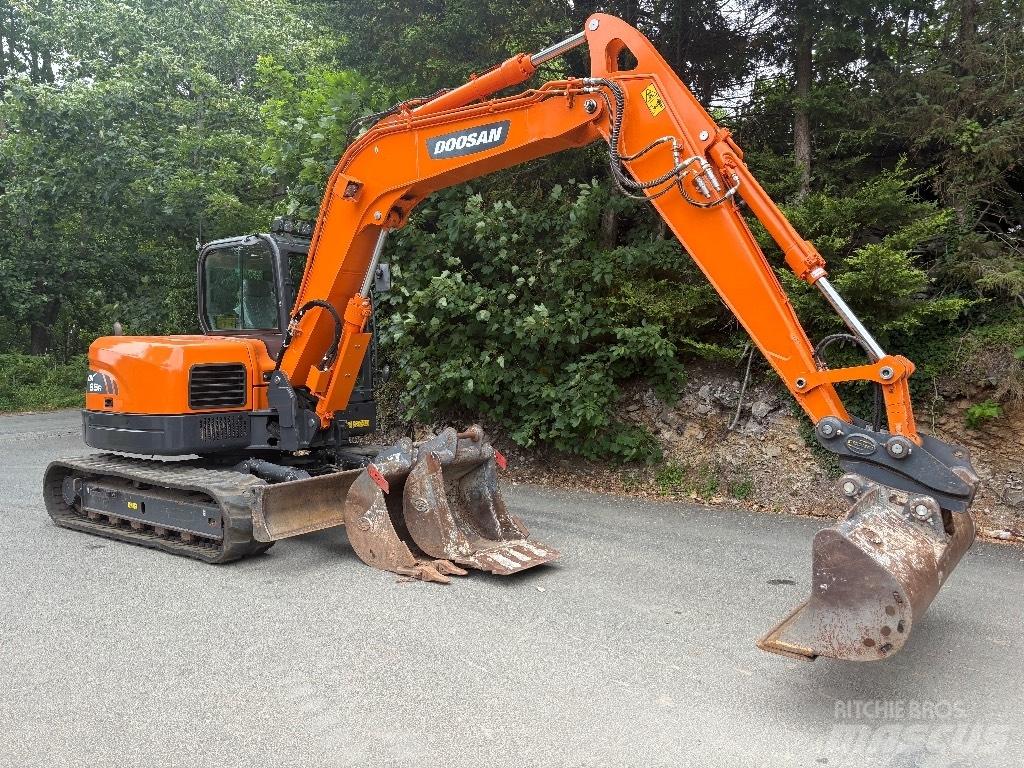 Doosan DX 85 R Середні екскаватори 7т. - 12т.