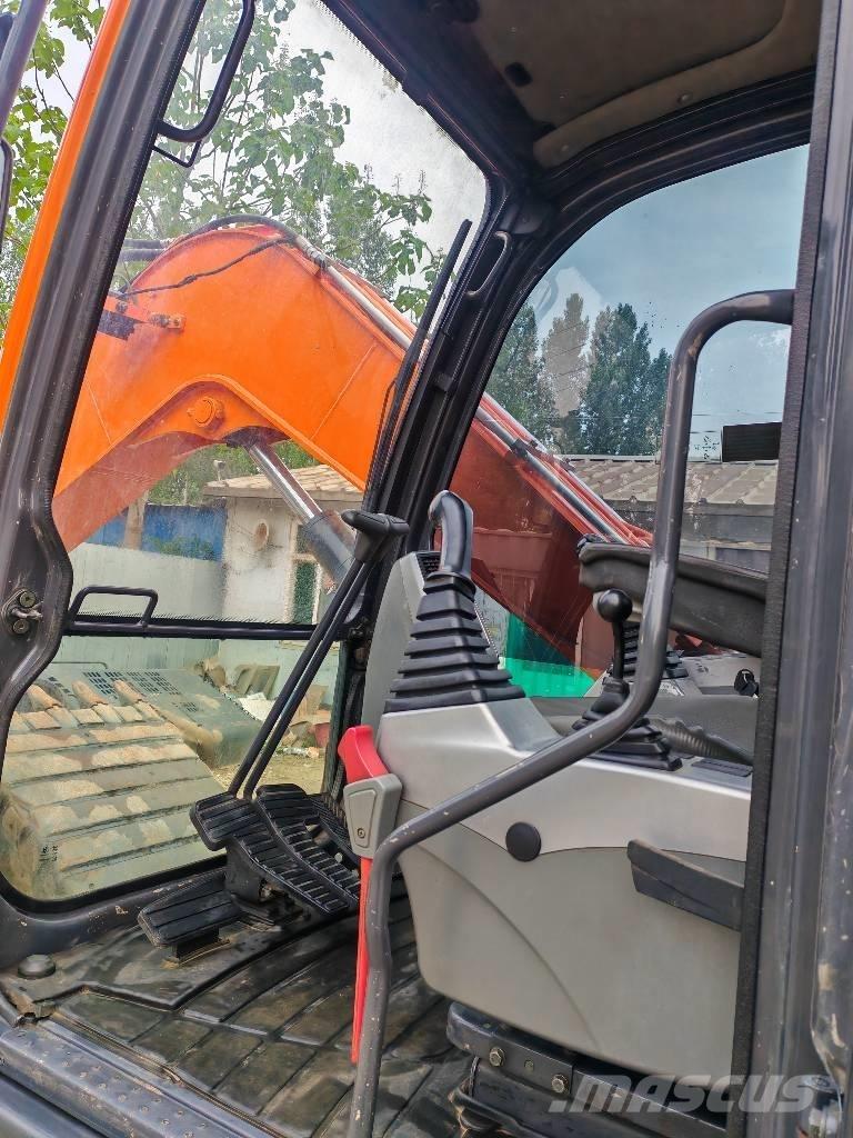 Doosan DX75-9C Середні екскаватори 7т. - 12т.