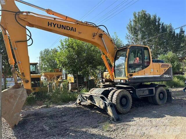 Hyundai 210W Колісні екскаватори
