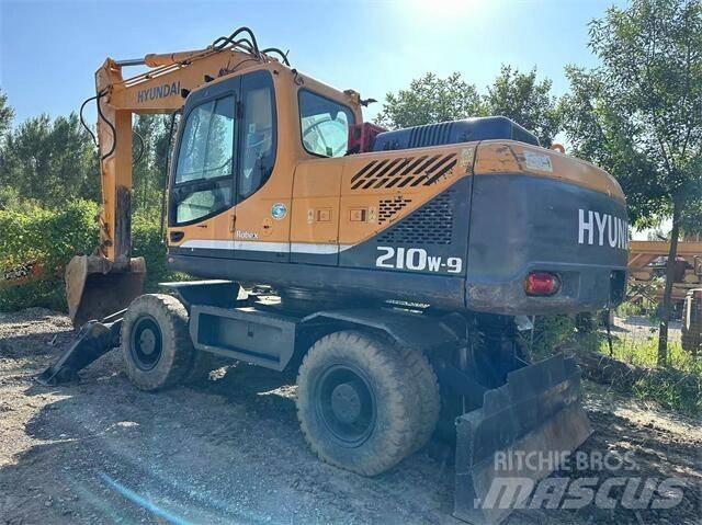 Hyundai 210W Колісні екскаватори