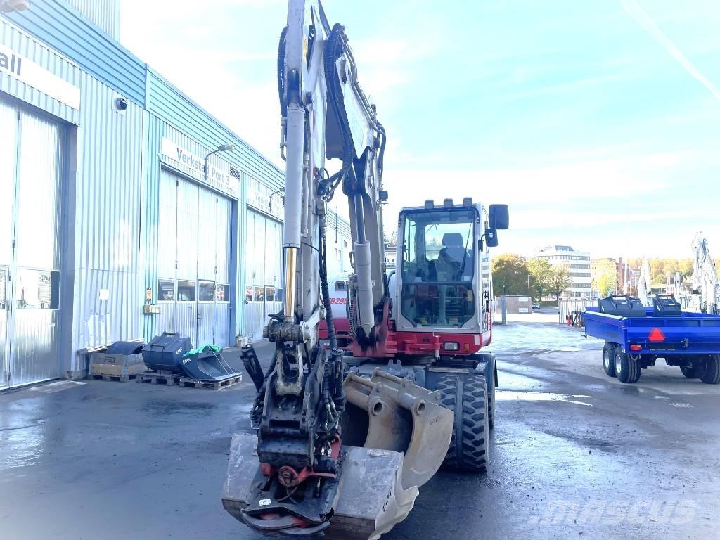 Takeuchi TB 295 W Колісні екскаватори