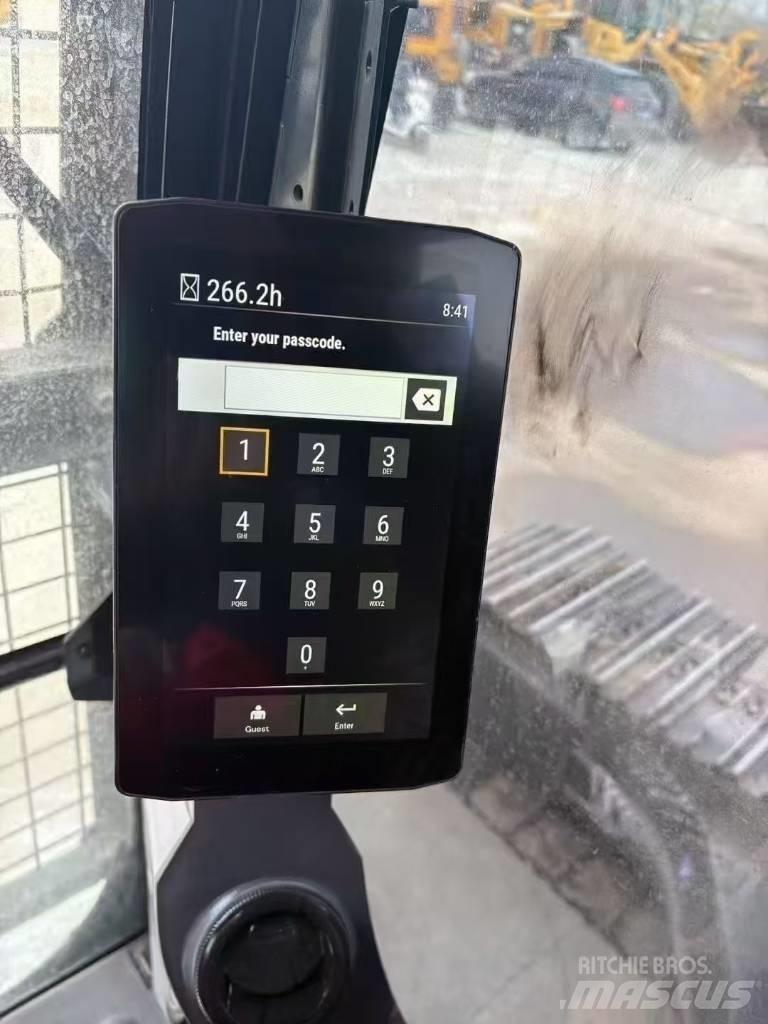 CAT 323GC Гусеничні екскаватори