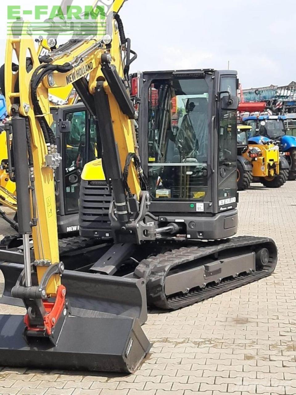 New Holland e65d Колісні екскаватори
