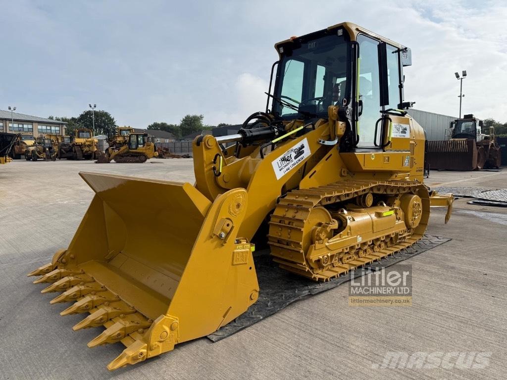 CAT 953 Гусеничні вантажники