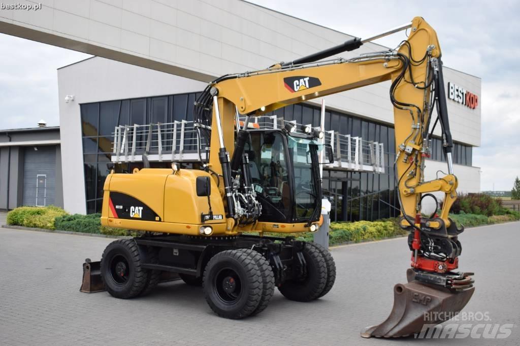 CAT M 313 D Колісні екскаватори