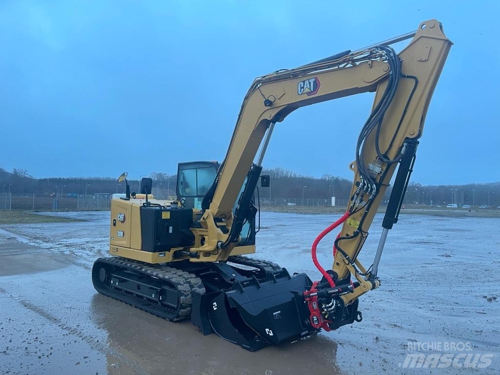 CAT 308 Середні екскаватори 7т. - 12т.