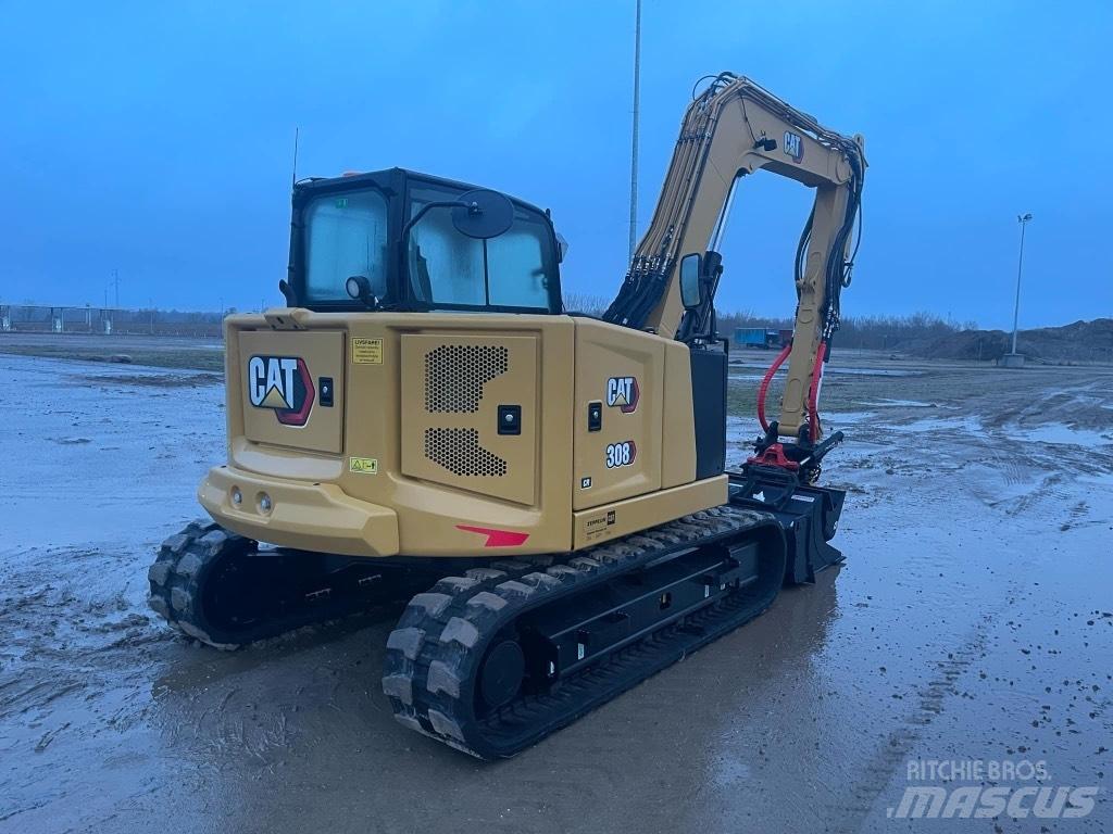 CAT 308 Середні екскаватори 7т. - 12т.