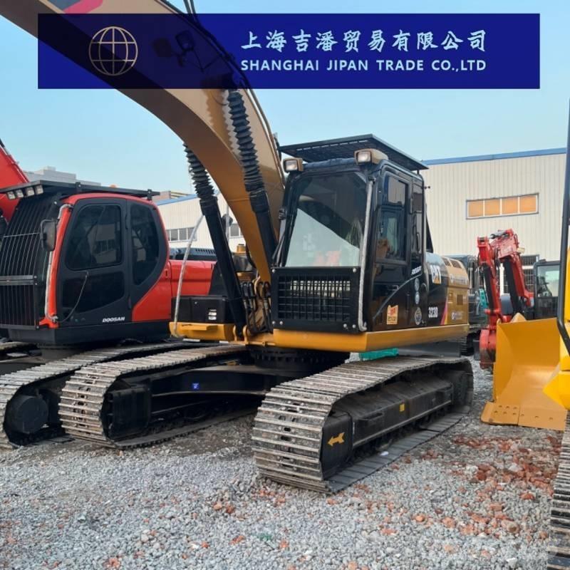 CAT 323 D Гусеничні екскаватори