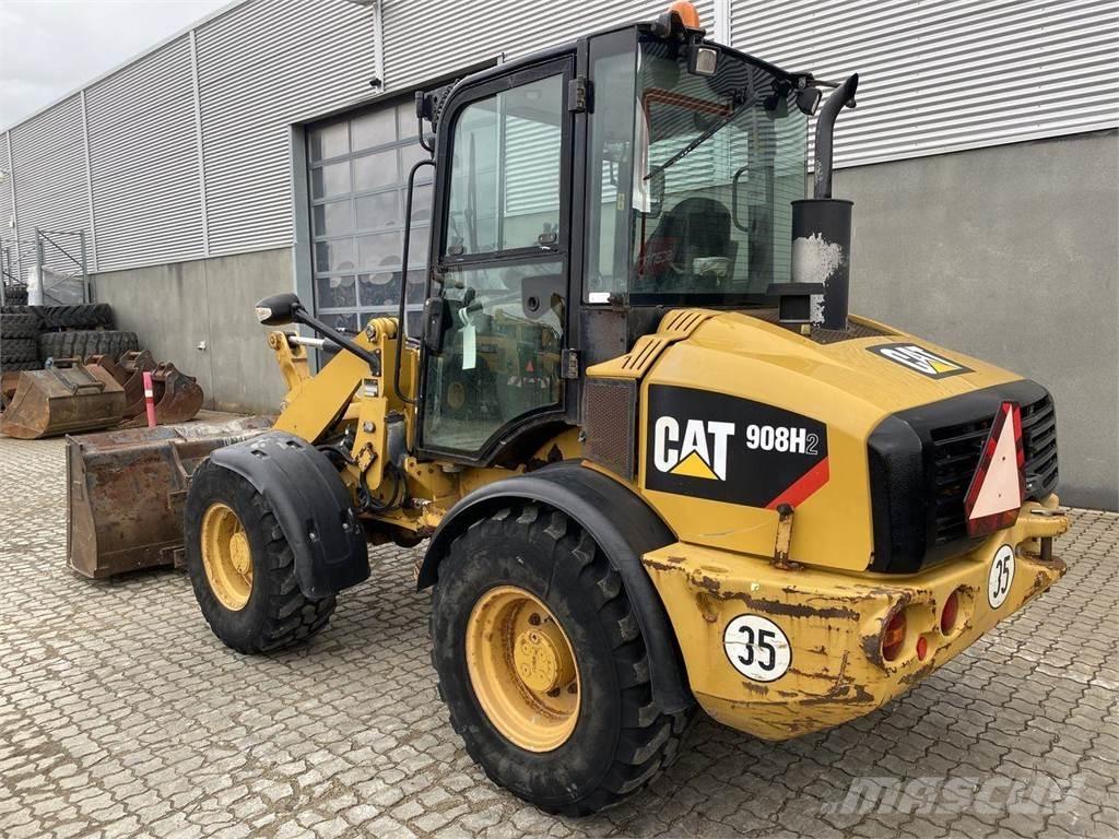 CAT 908 H2 Багатофункціональне обладнання для вантажних і землекопальних робіт