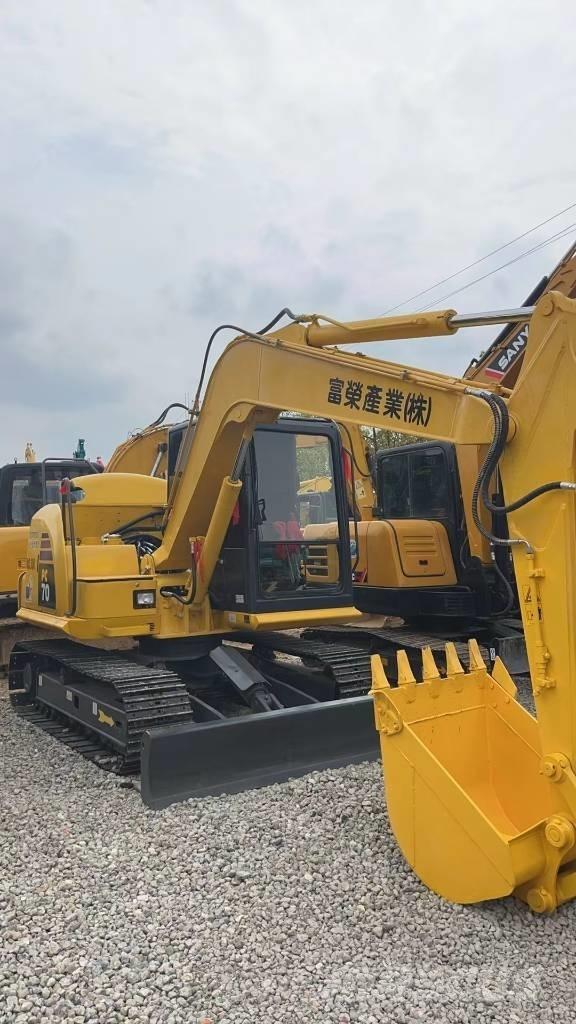 Komatsu PC 70 Середні екскаватори 7т. - 12т.
