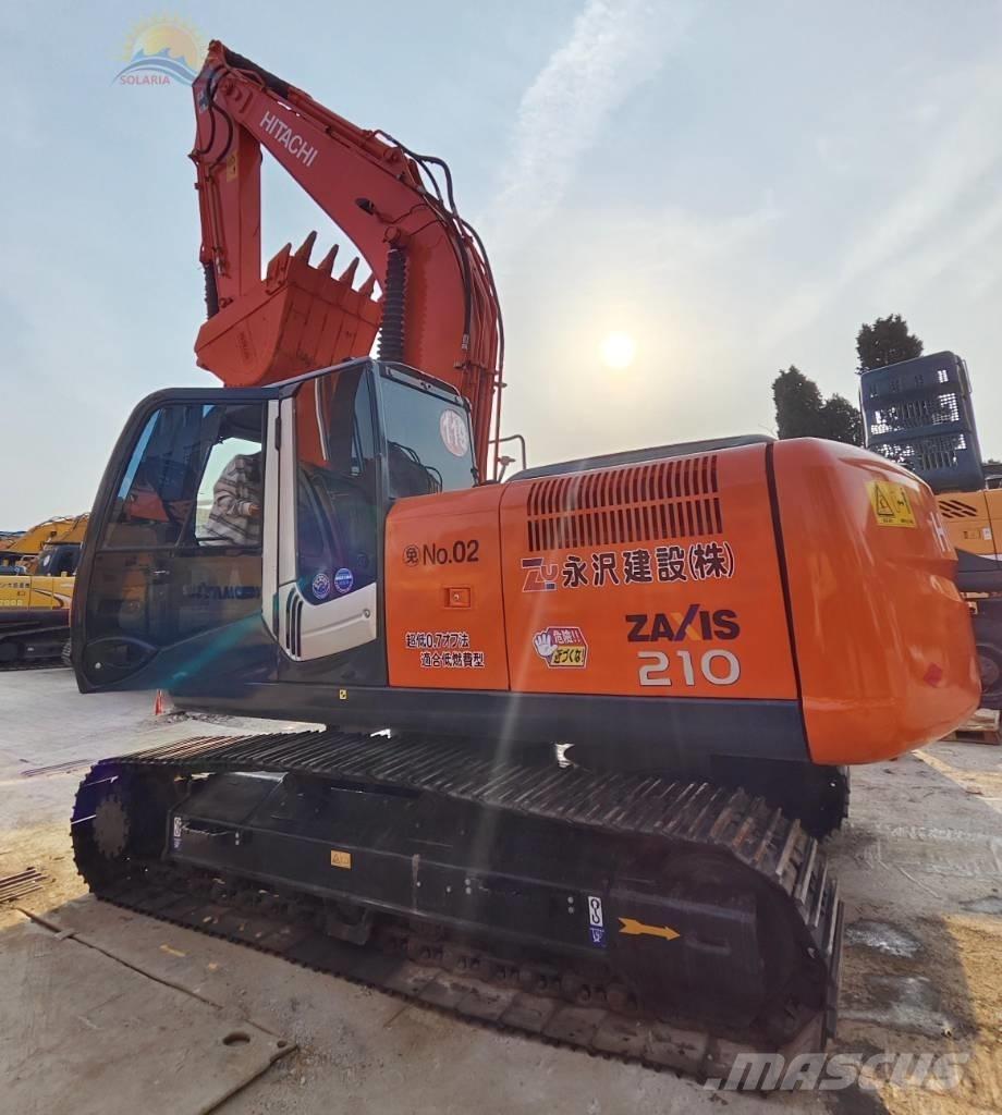 Hitachi ZX 210 Гусеничні екскаватори